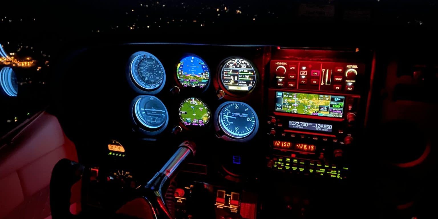 Cockpit view of a night flight.